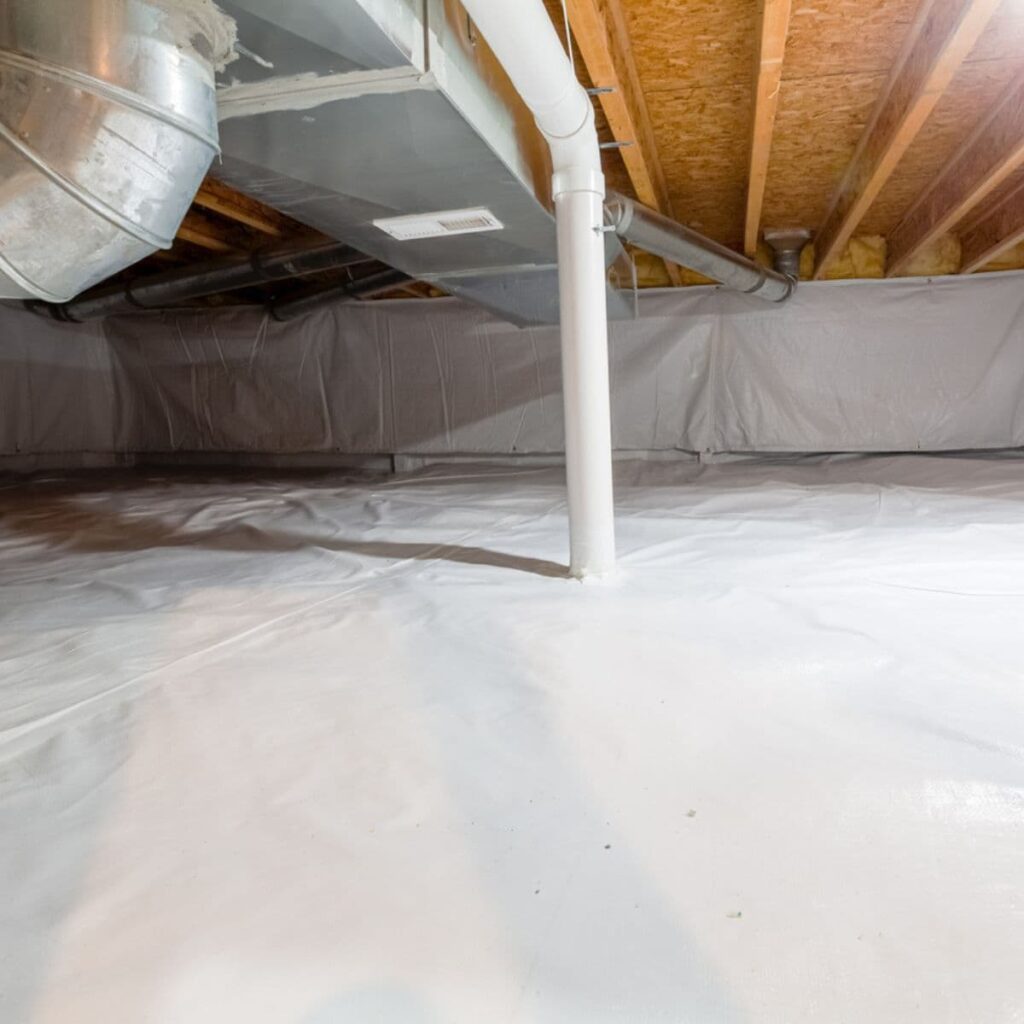 A clean, encapsulated crawl space with a white vapor barrier and exposed ductwork overhead