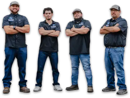 Four men wearing G.L. Hunt branded shirts and jeans stand with crossed arms, posing against a transparent background